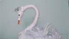 Decorating your garden with a swan made from plastic bottles